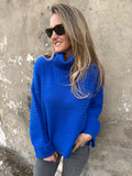 Cuello alto punto arroz azul