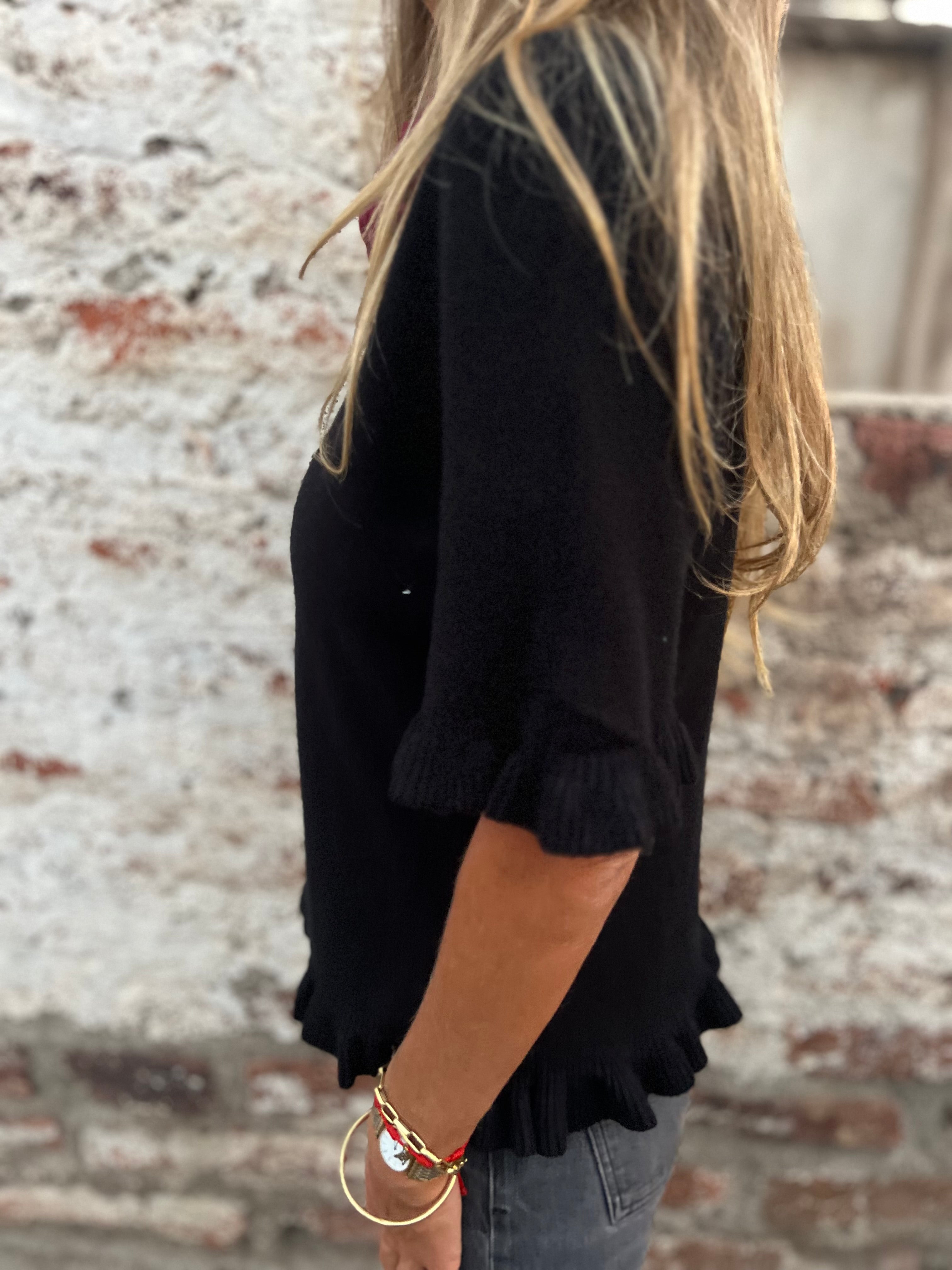 Polera/ Chaleco vuelitos negra