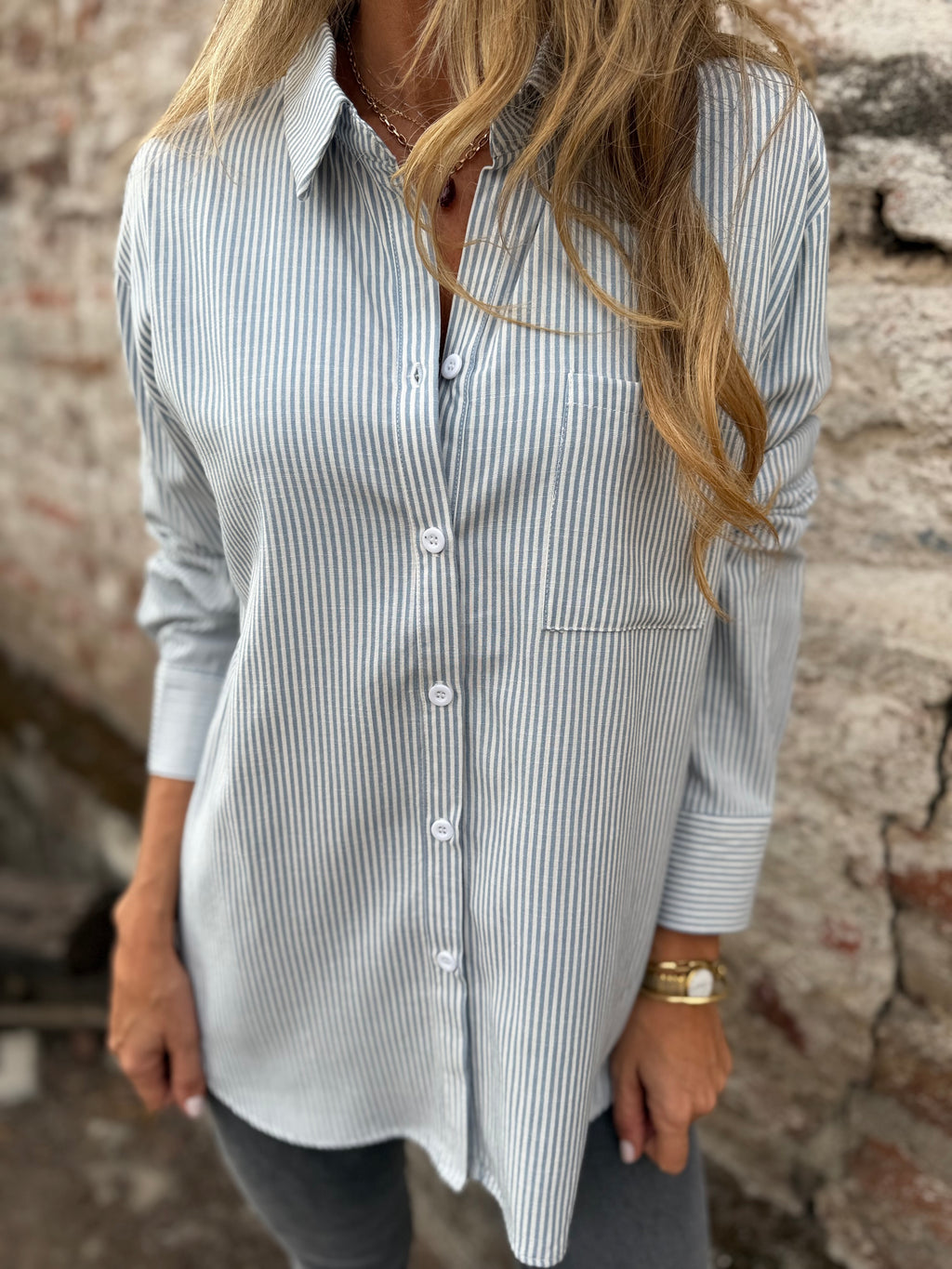 Blusa líneas delgadas celeste