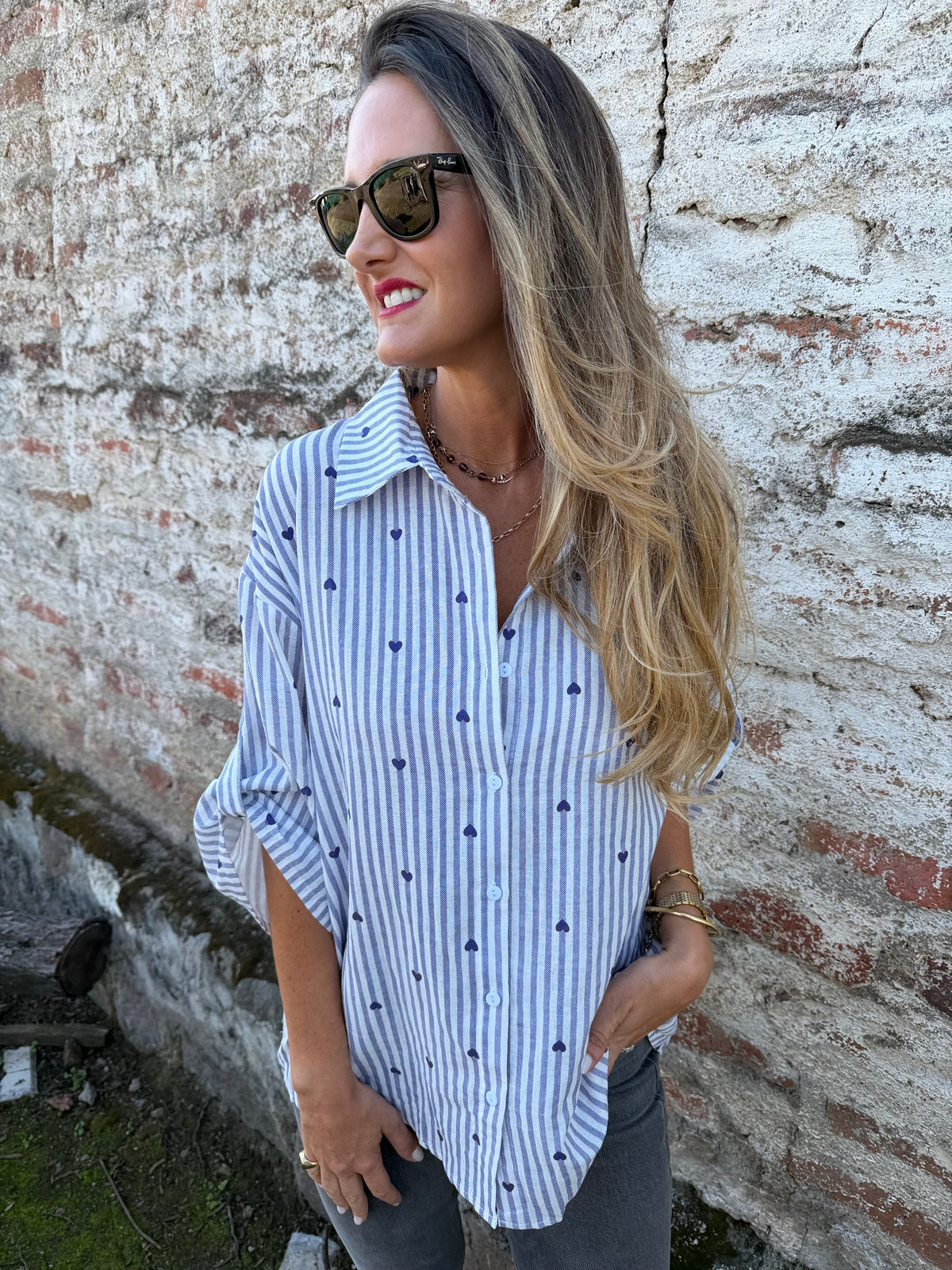 Blusa líneas y corazones azul