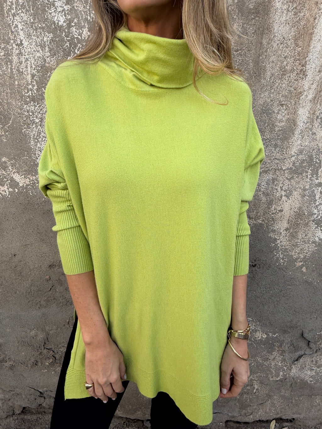 Chaleco maxxi cuello tortuga verde eléctrico