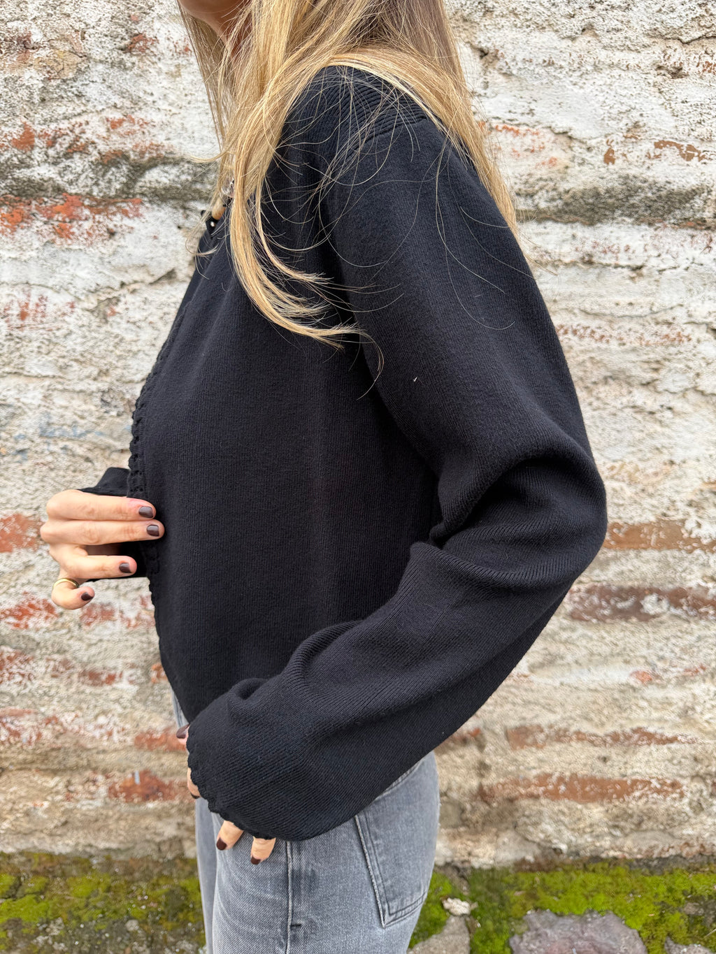 Chaquetita tejida vuelitos negra