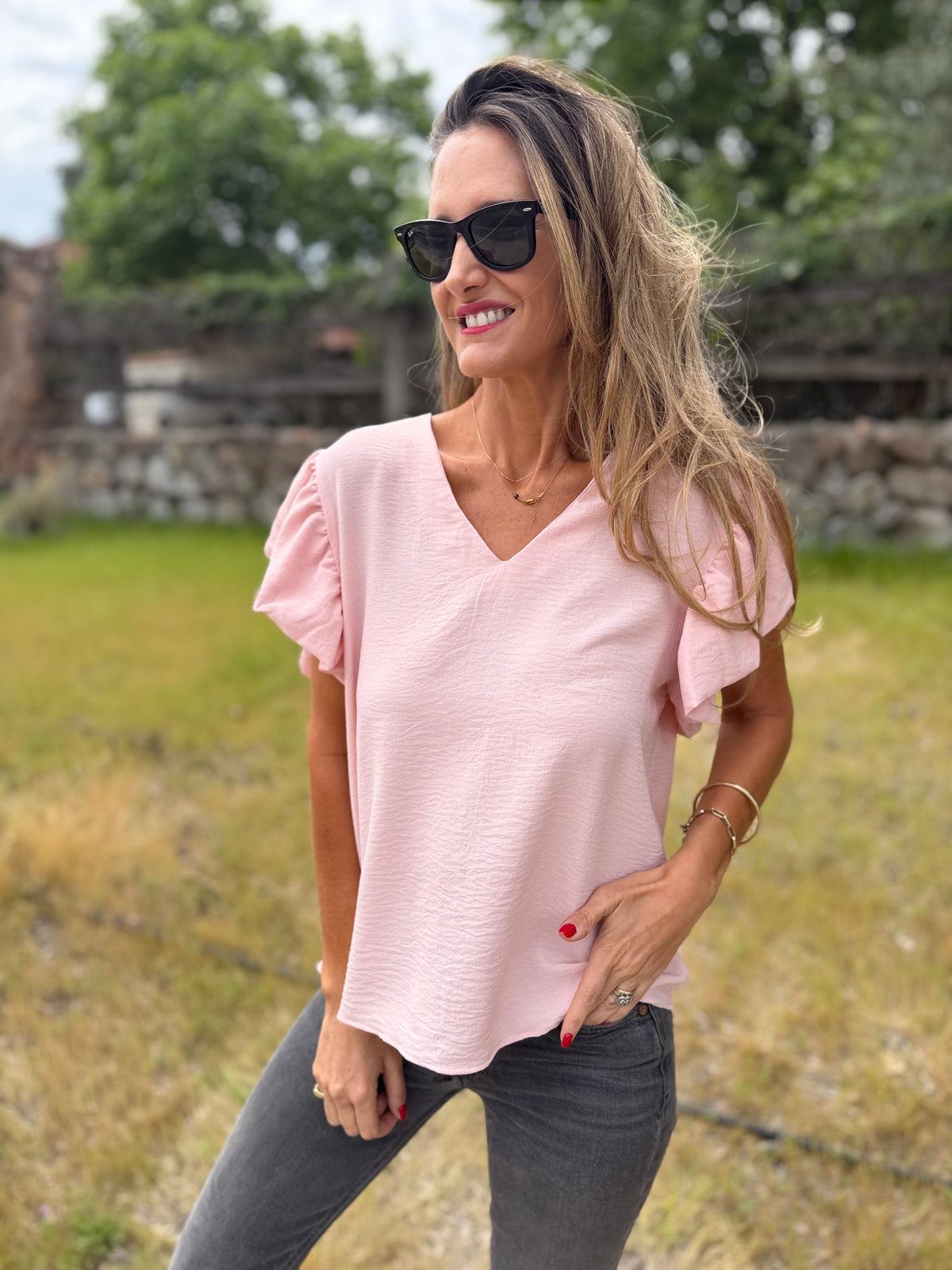 Blusa crep vuelitos mangas rosada