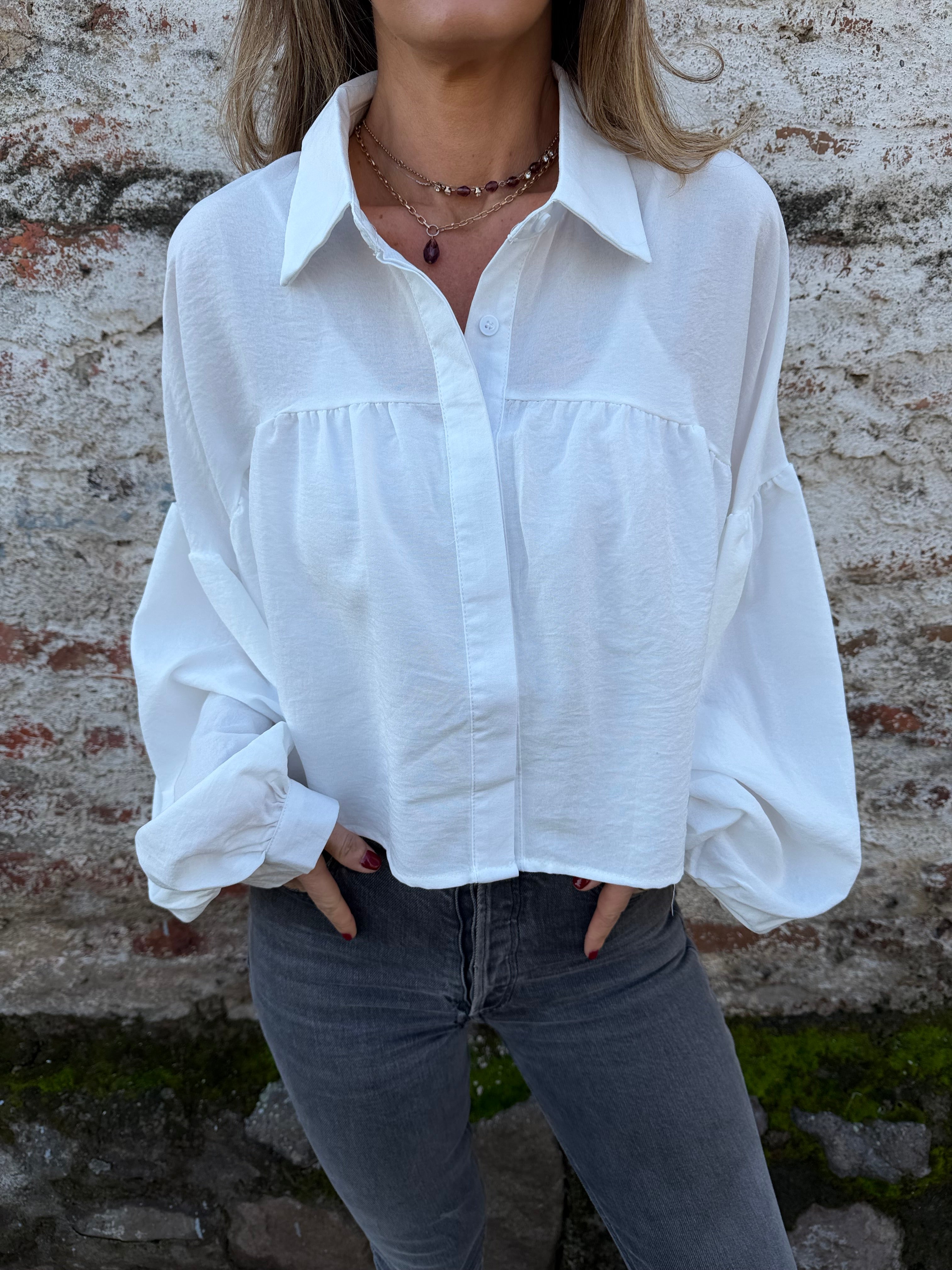 Blusa capas y manga globo blanca
