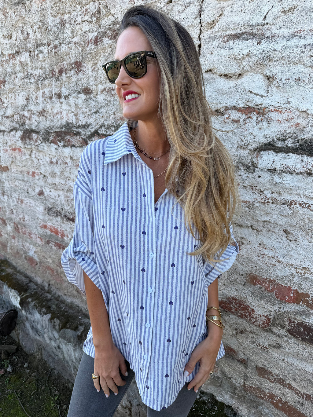 Blusa líneas y corazones azul