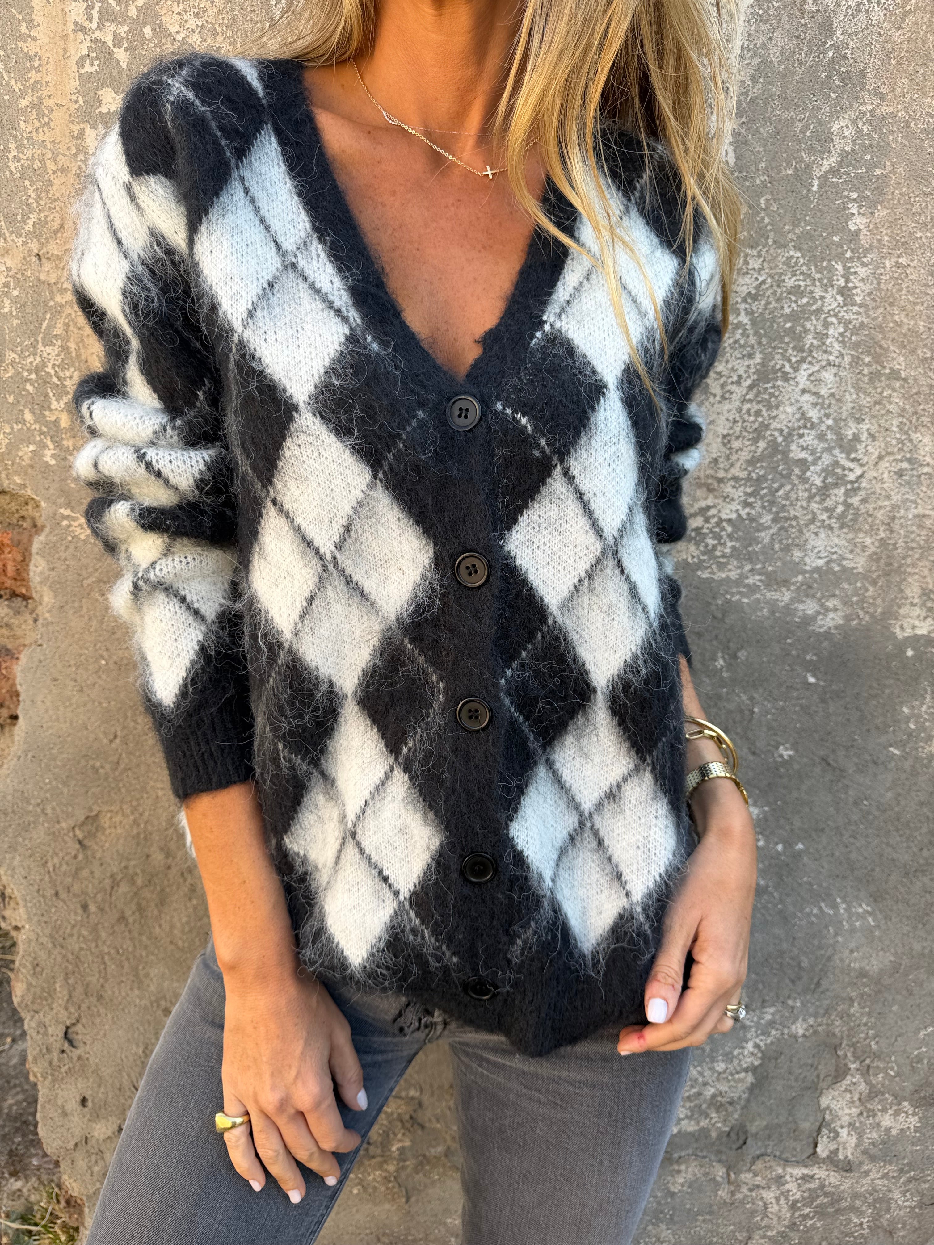 Chaleco peludito rombos negro