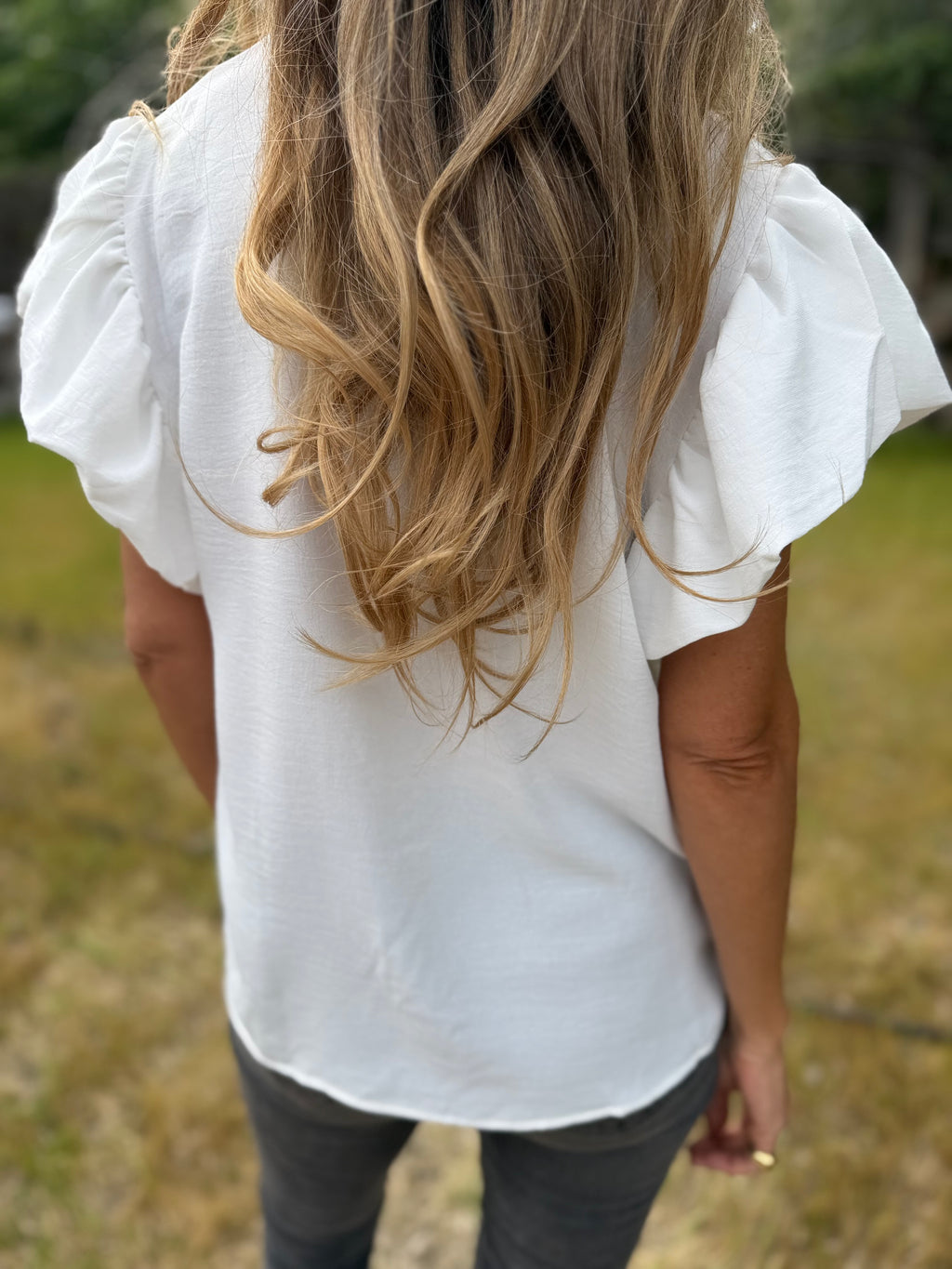 Blusa crep vuelitos mangas blanca