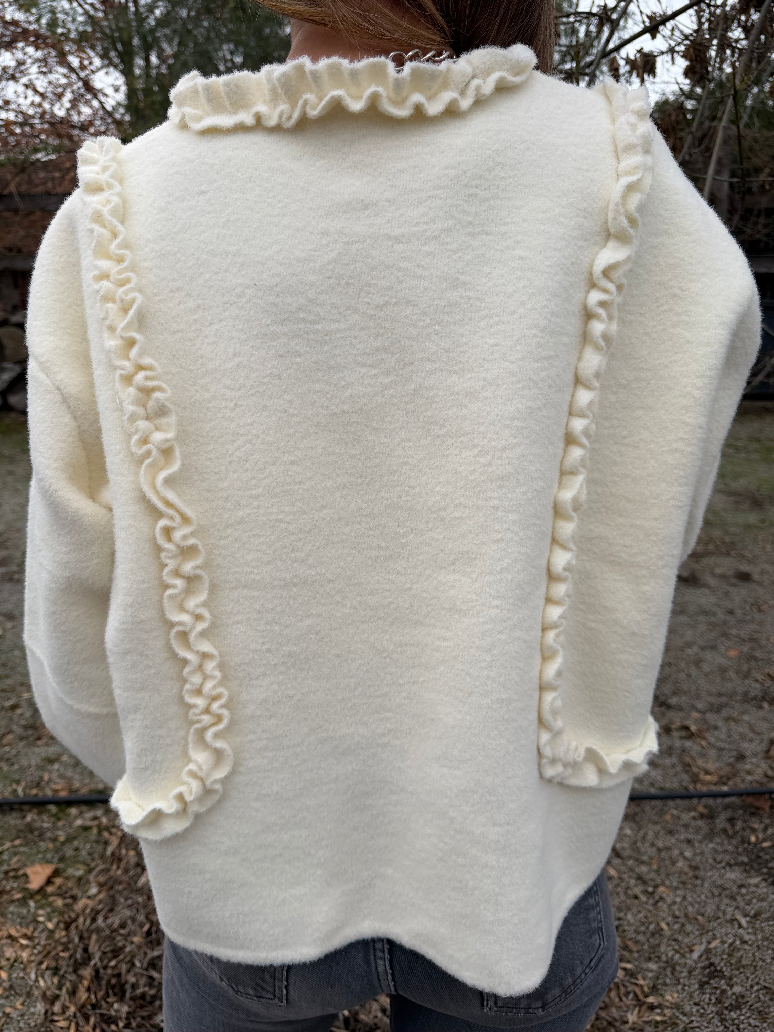 Chaquetita paño vuelitos blanca