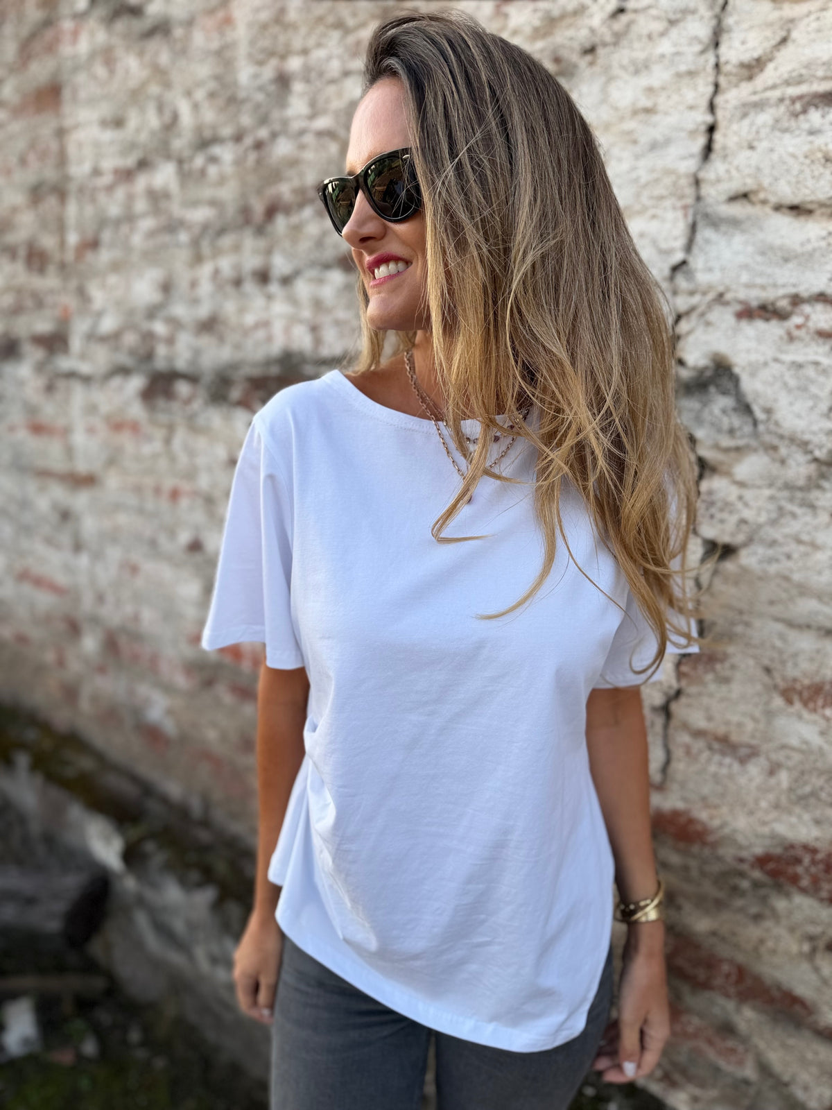 Polera largo irregular blanca