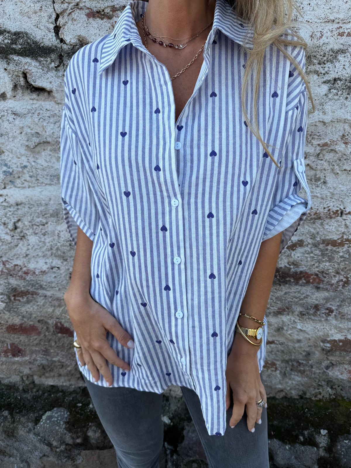 Blusa líneas y corazones azul