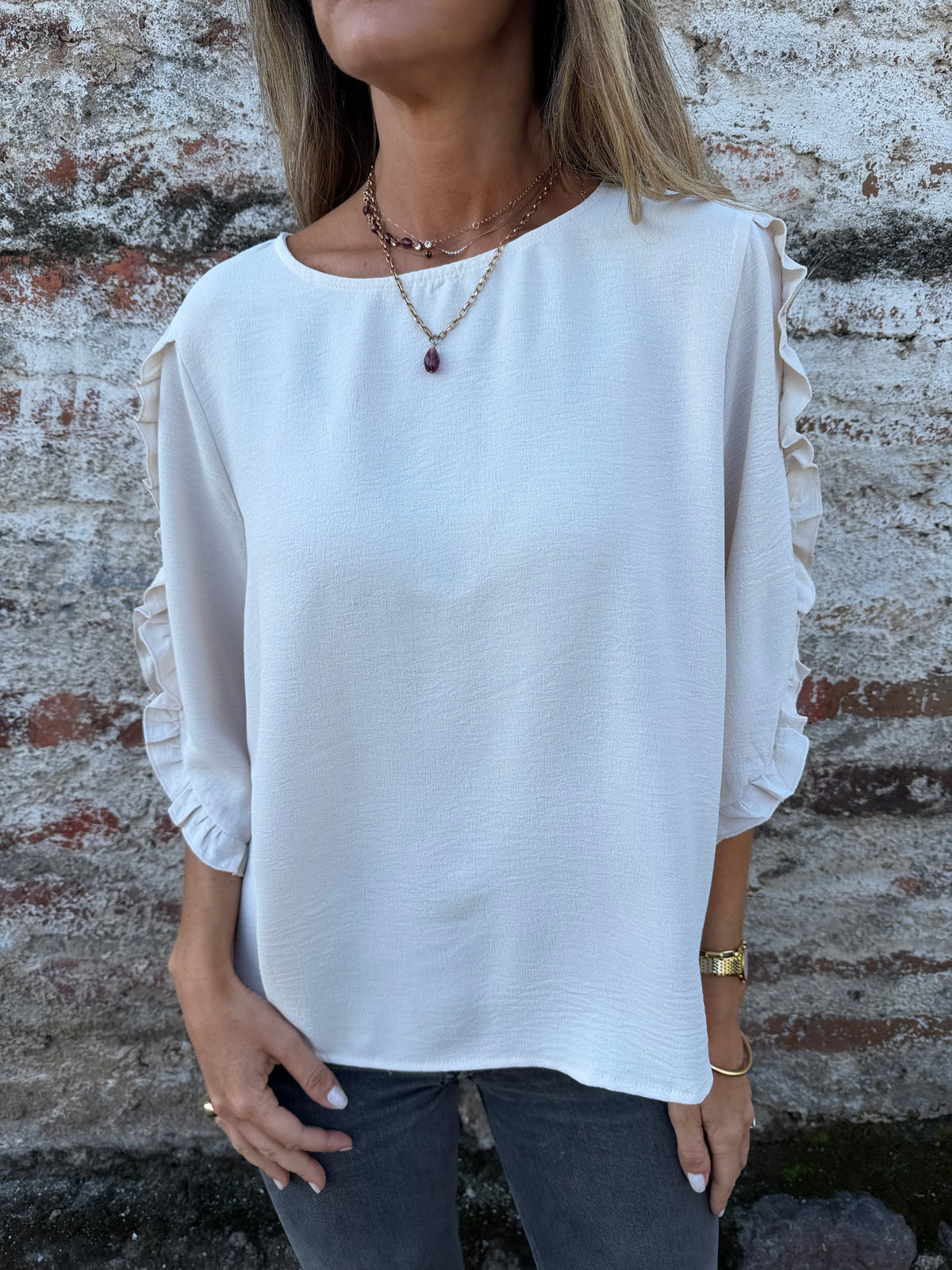 Blusa crep vuelitos mangas crudo
