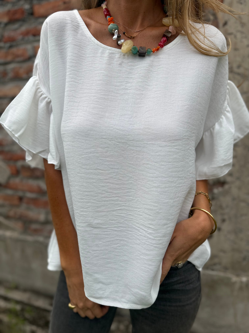 Blusa cuello subido volados blanca