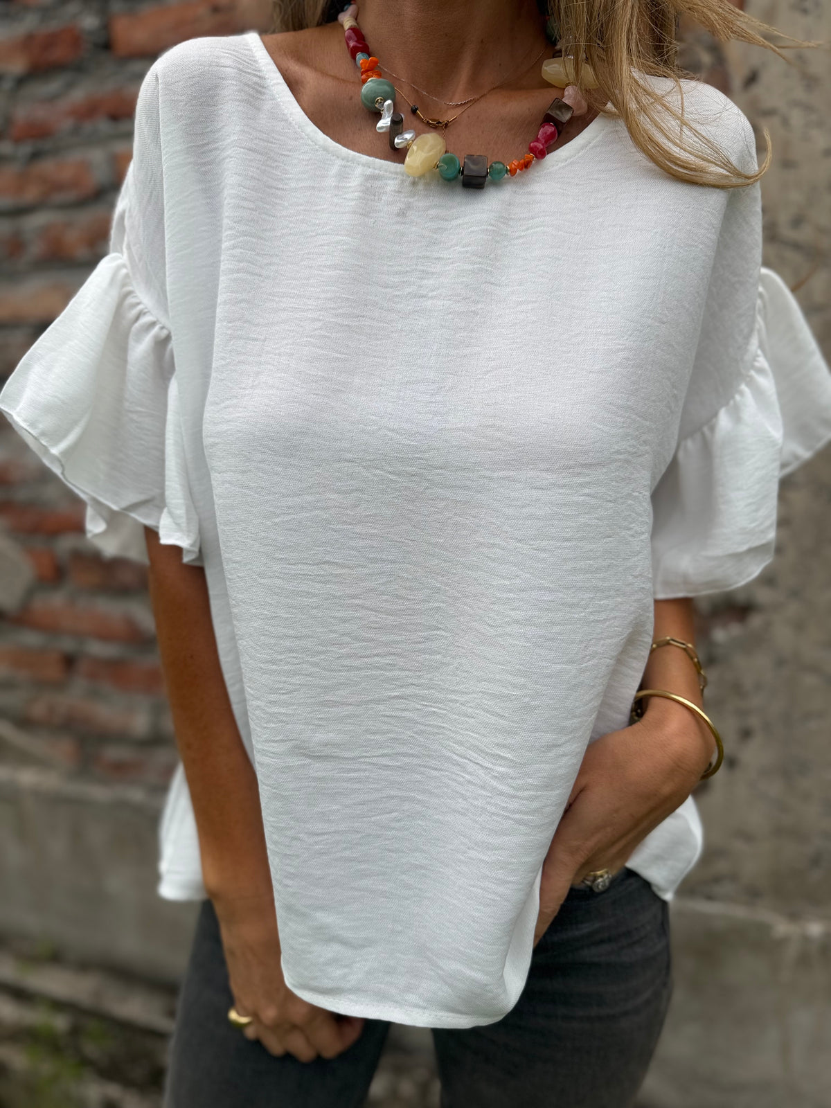 Blusa cuello subido volados blanca