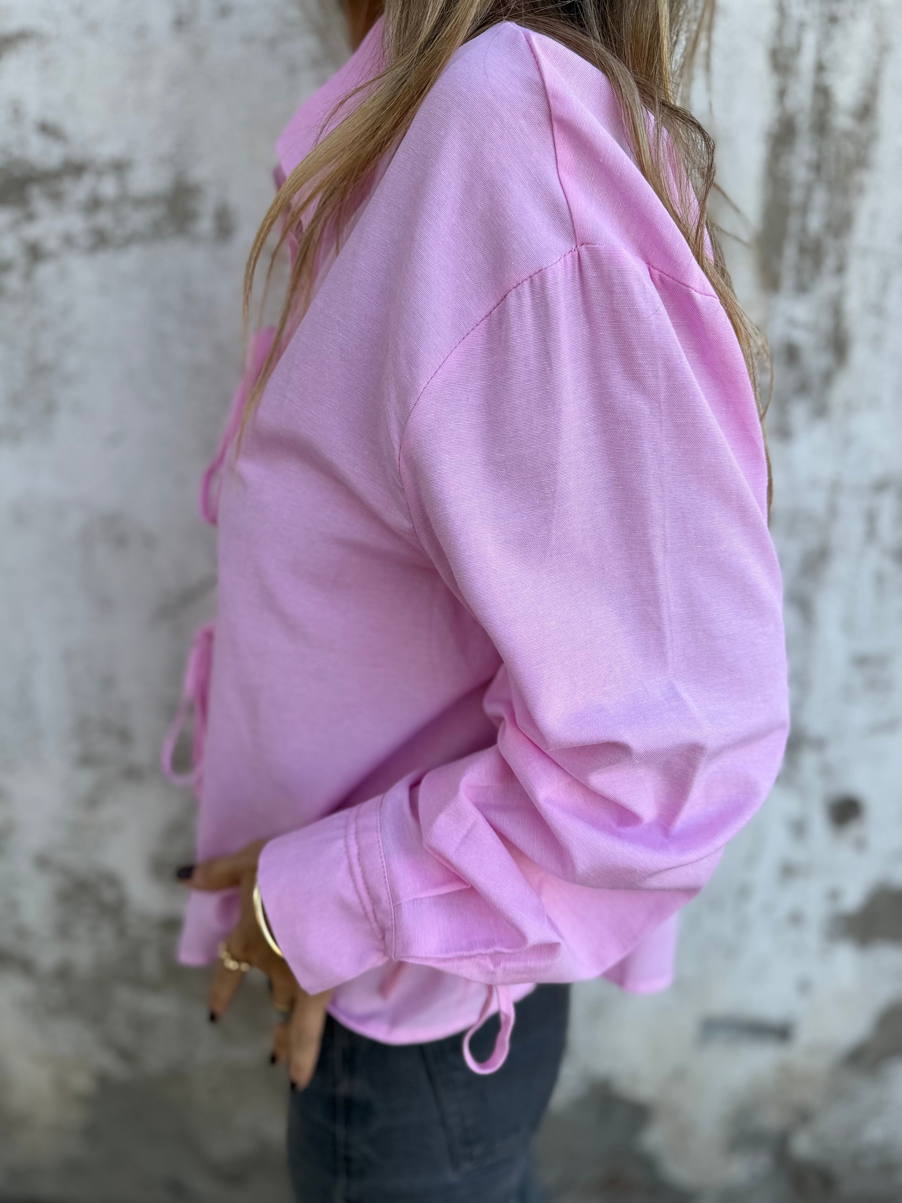 Blusa amarritas y botones escondidos rosada