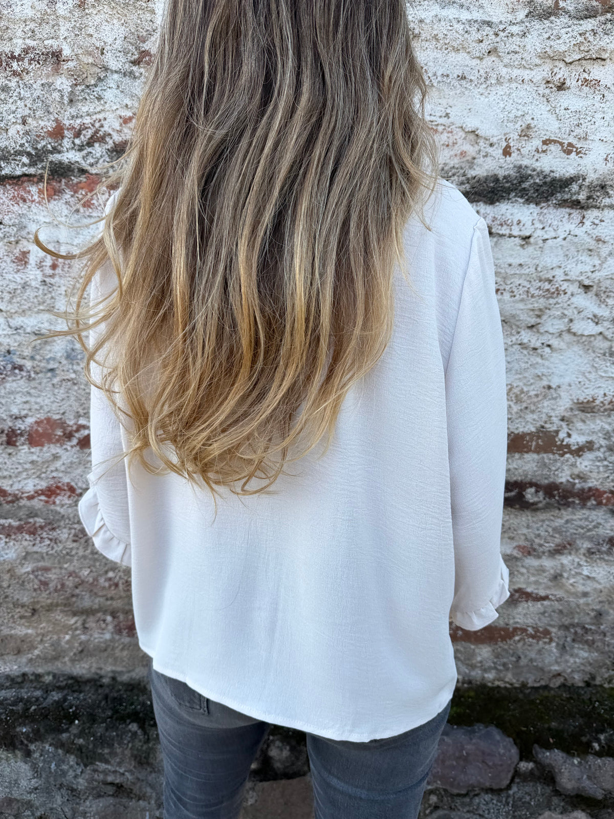 Blusa crep vuelitos mangas crudo