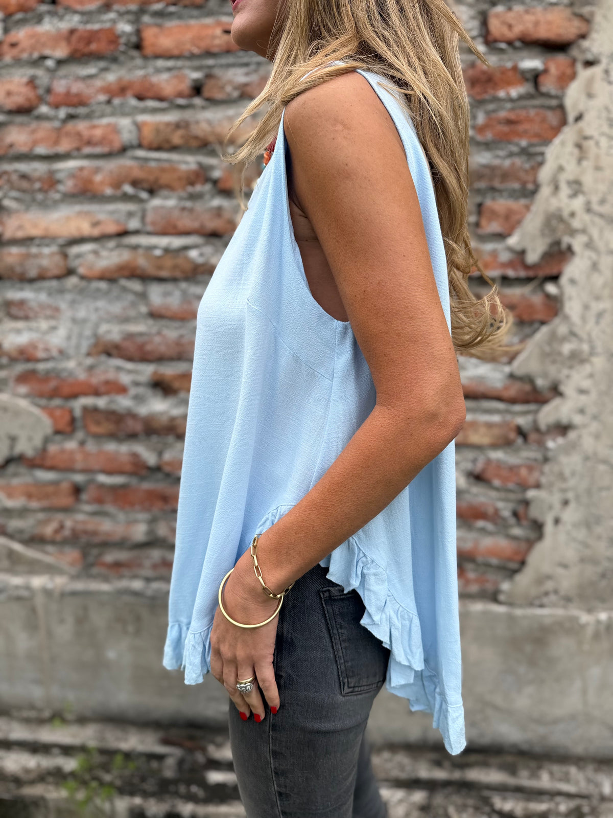 Blusa espalda abierta vuelitos celeste