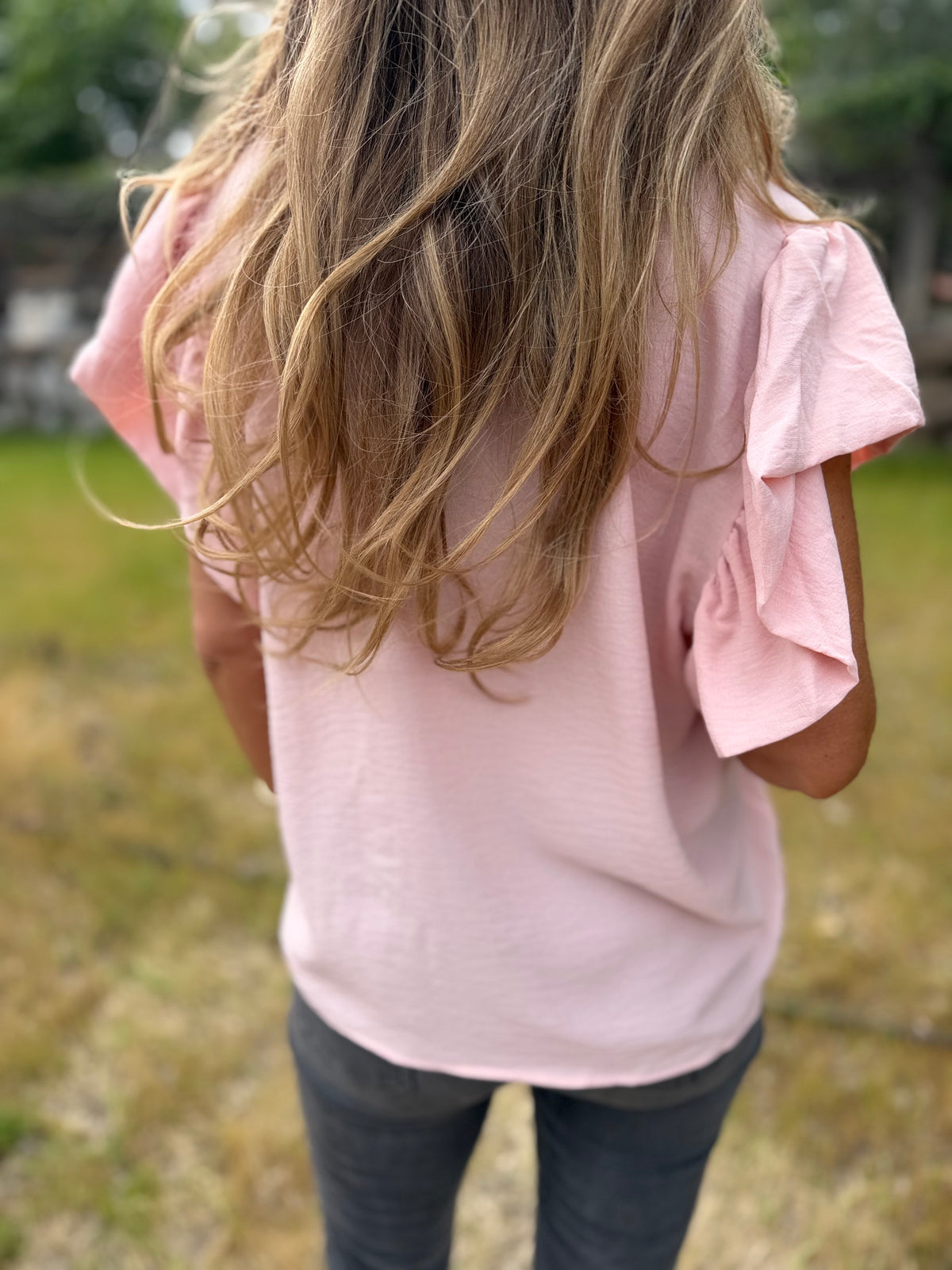 Blusa crep vuelitos mangas rosada
