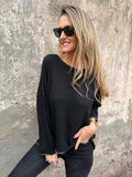 Maxxi polera lanilla bordes plateados negra