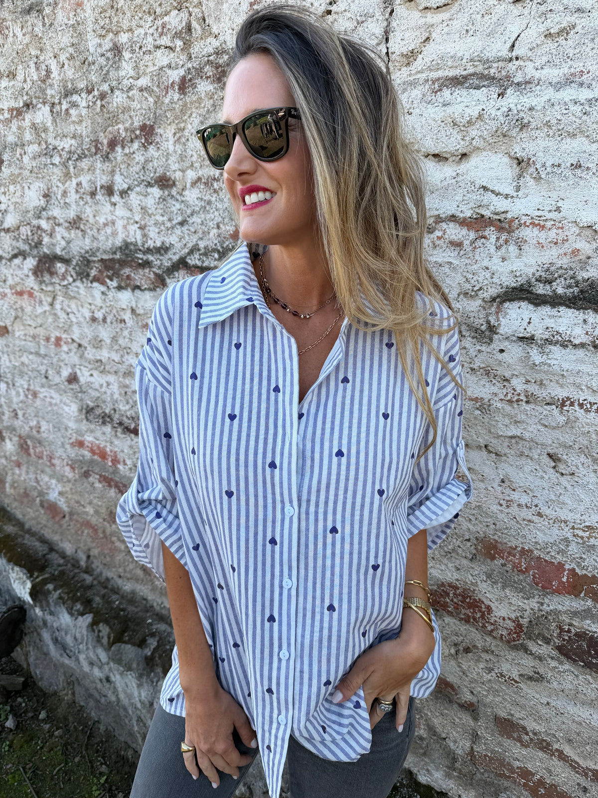 Blusa líneas y corazones azul
