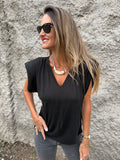 Polera hombreras plisadas negra