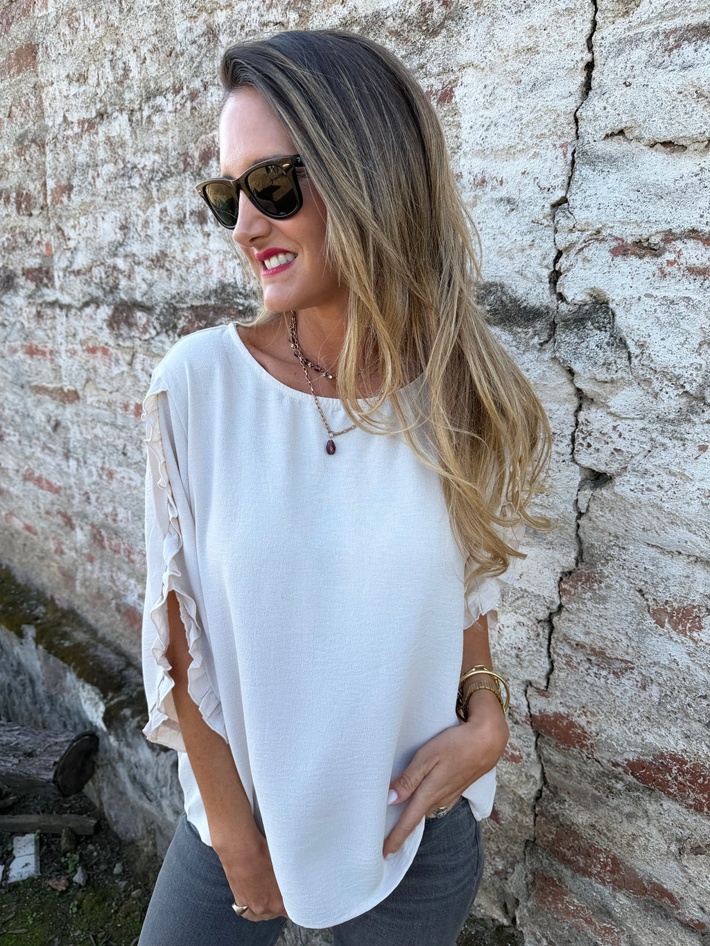 Blusa crep vuelitos mangas crudo