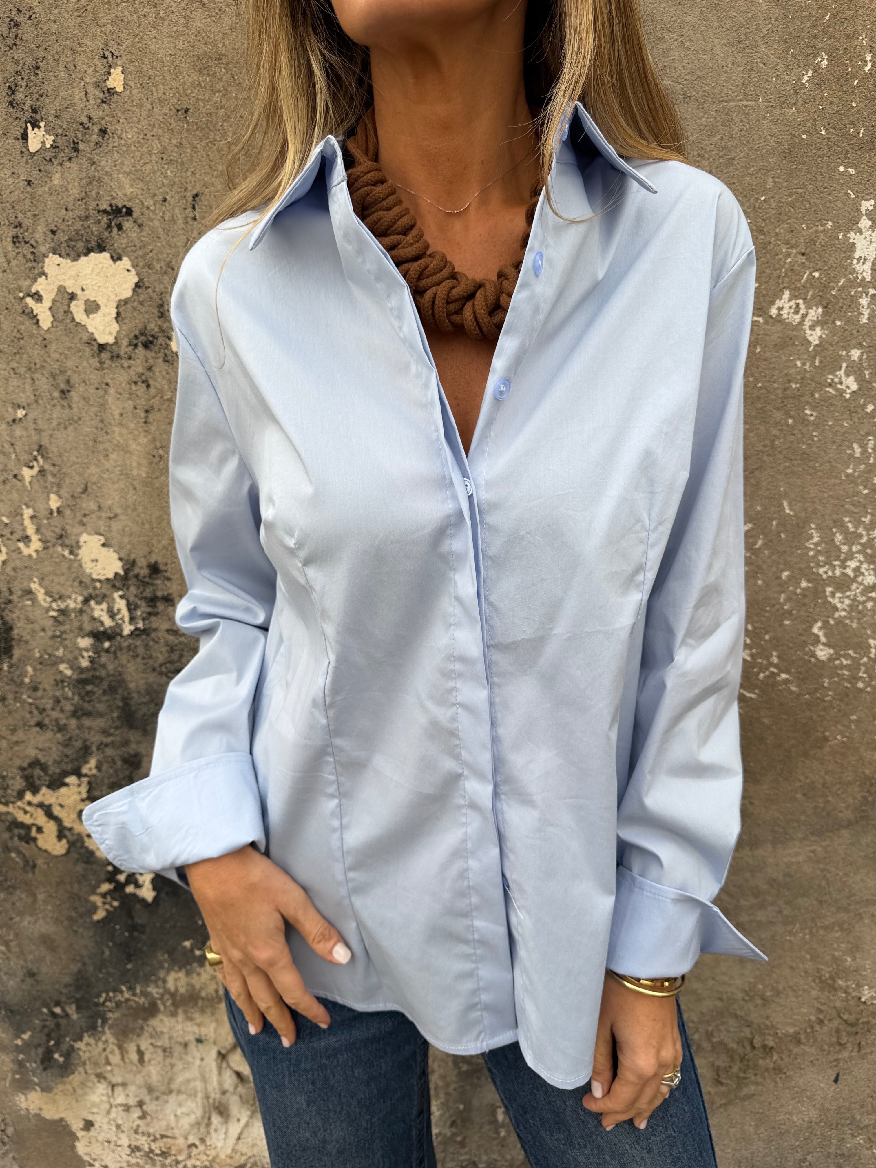 Blusa sastre botones escondidos celeste