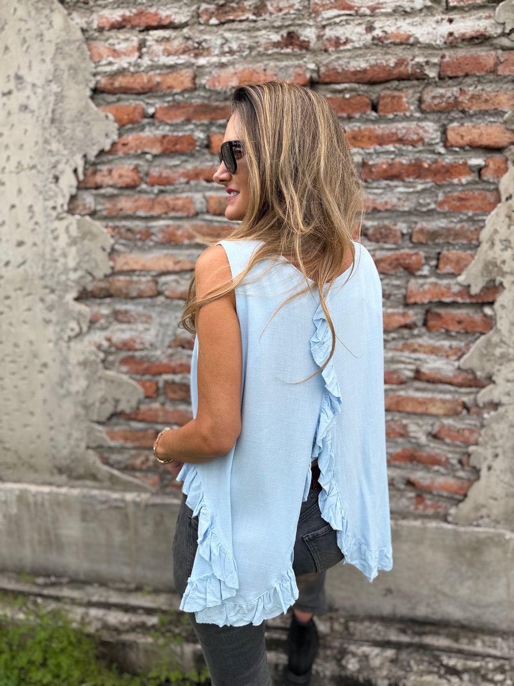 Blusa espalda abierta vuelitos celeste