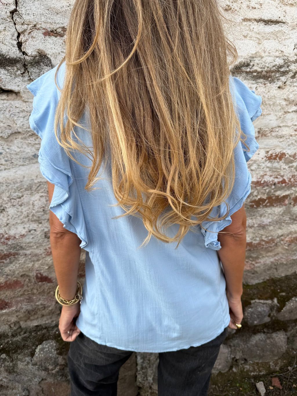 Blusa larga vuelitos laterales celeste
