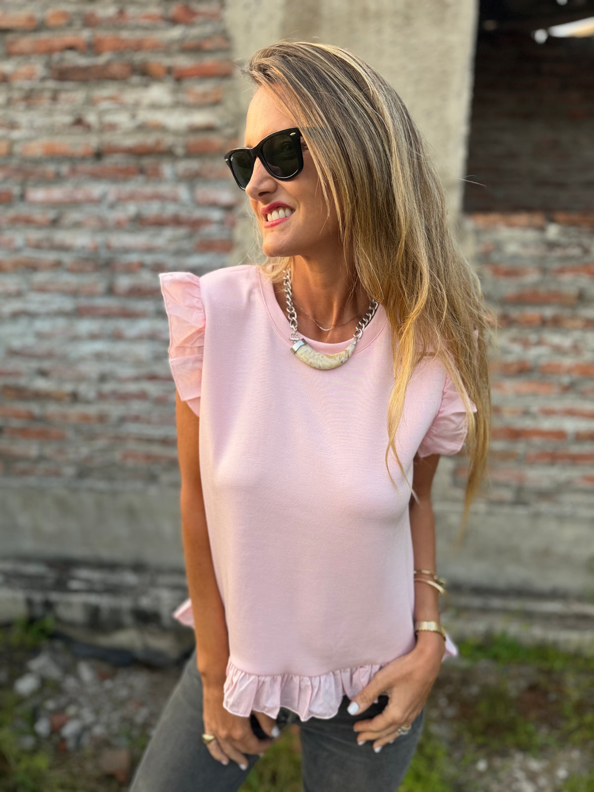 Polera vuelitos doble rosado