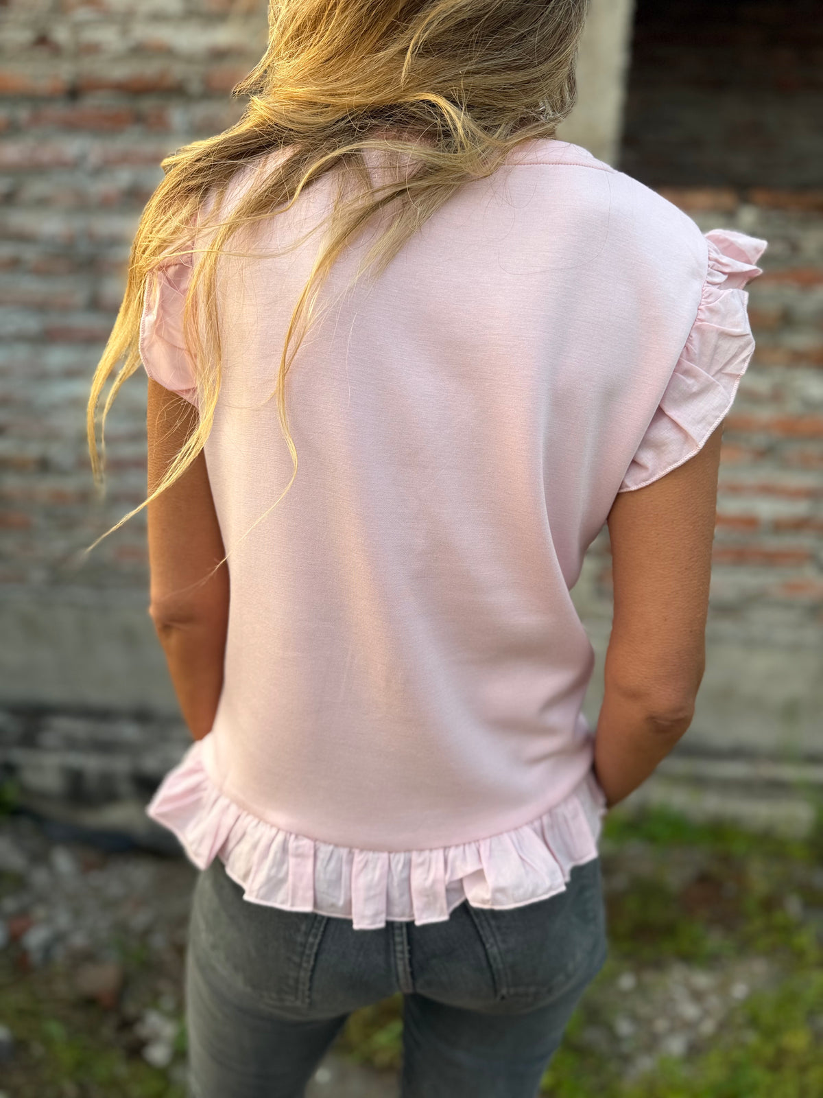 Polera vuelitos doble rosado