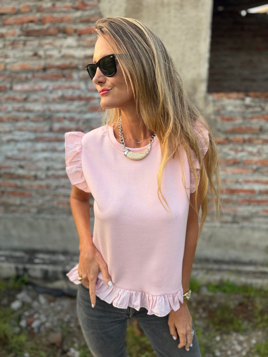 Polera vuelitos doble rosado